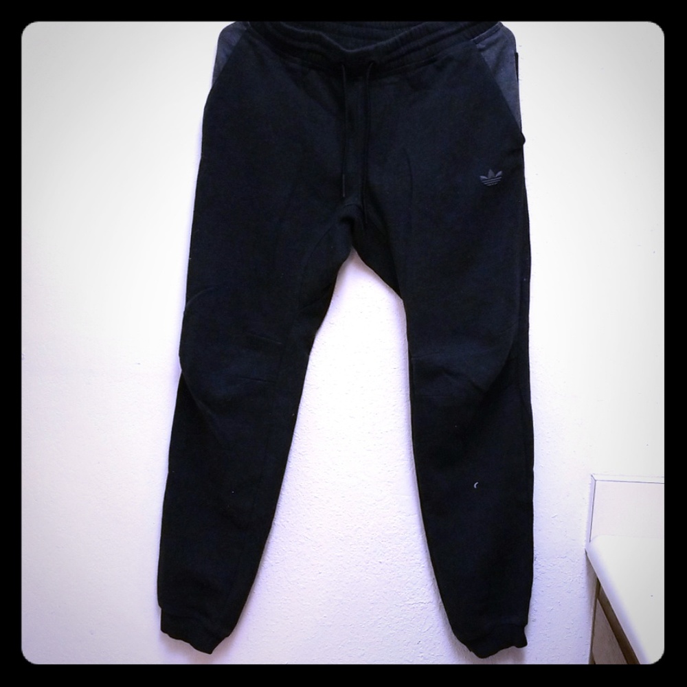 Black and grey Adidas sweat pants